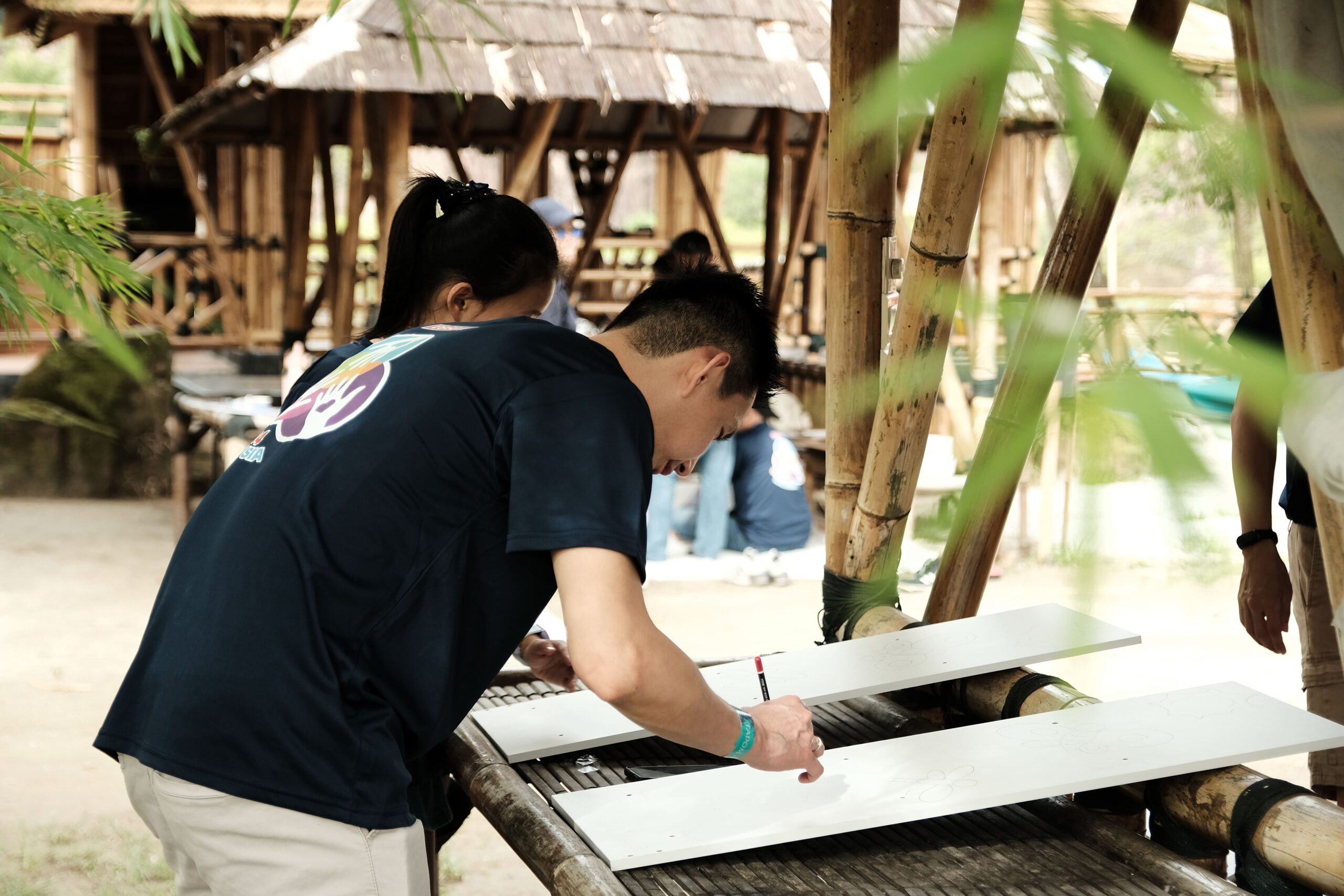Building bookshelves through CSR Team building program